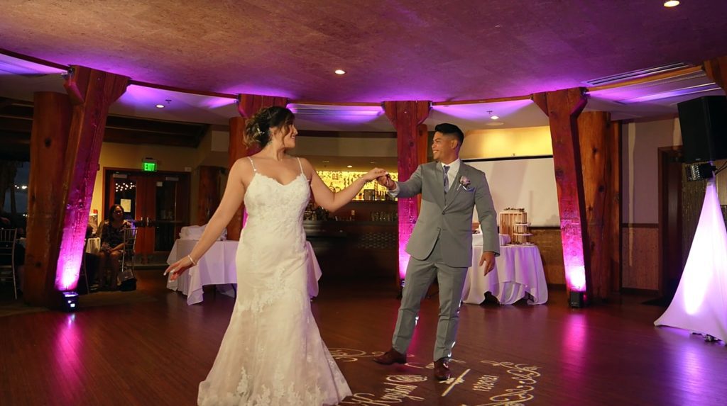 Bride and groom on the dance floor for their Bali Hai restaurant wedding