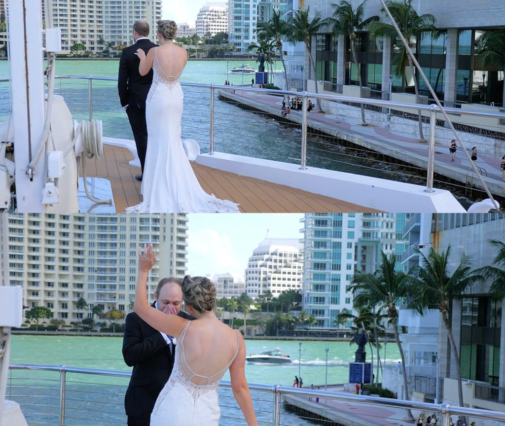 Bride approaches groom for first look on a boat by Cydne Robinson Films