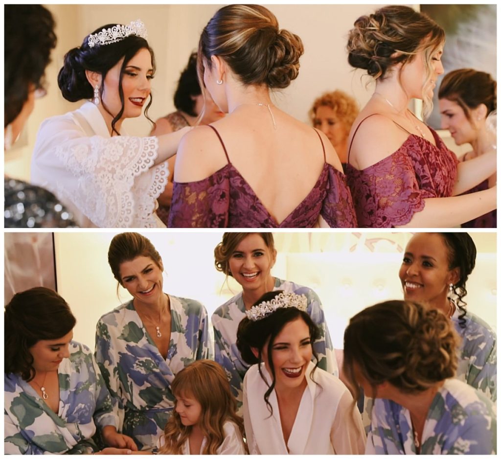 bridal party gets dressed and laughs by destination wedding videographer